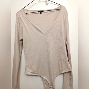 Dynamite Plunge Neck Cream Bodysuit